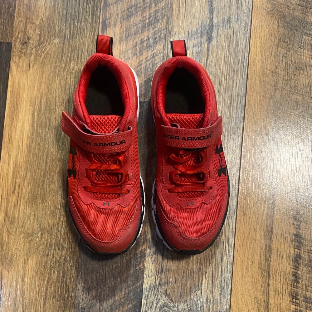 Under Armour Kids Red and Black Sneakers with strap closure. Little boys size 2